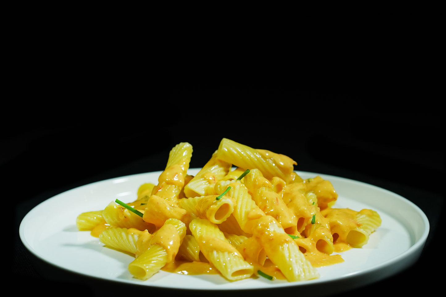 Pasta con salsa cítrica de tomate cherry y queso feta