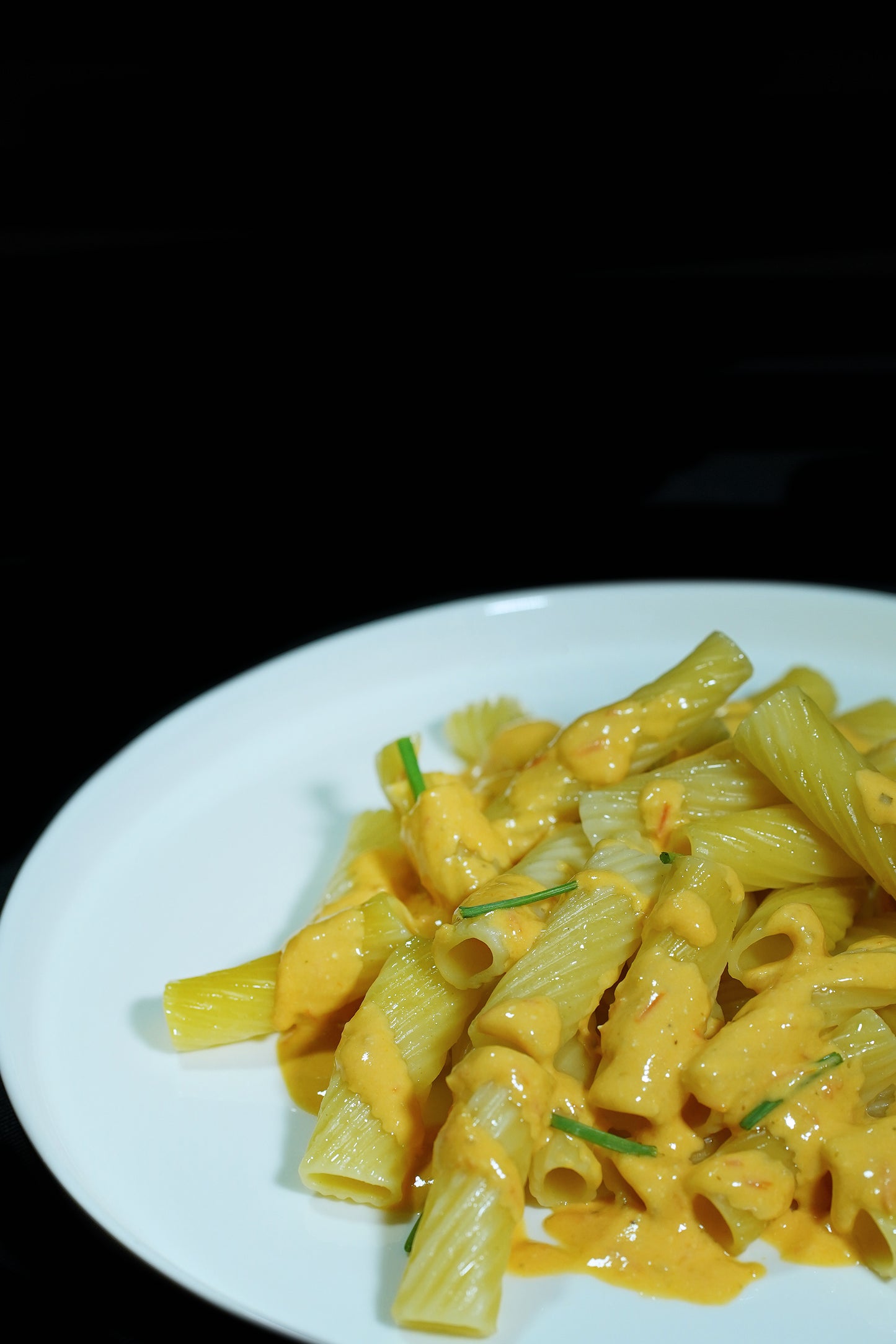 Pasta con salsa cítrica de tomate cherry y queso feta