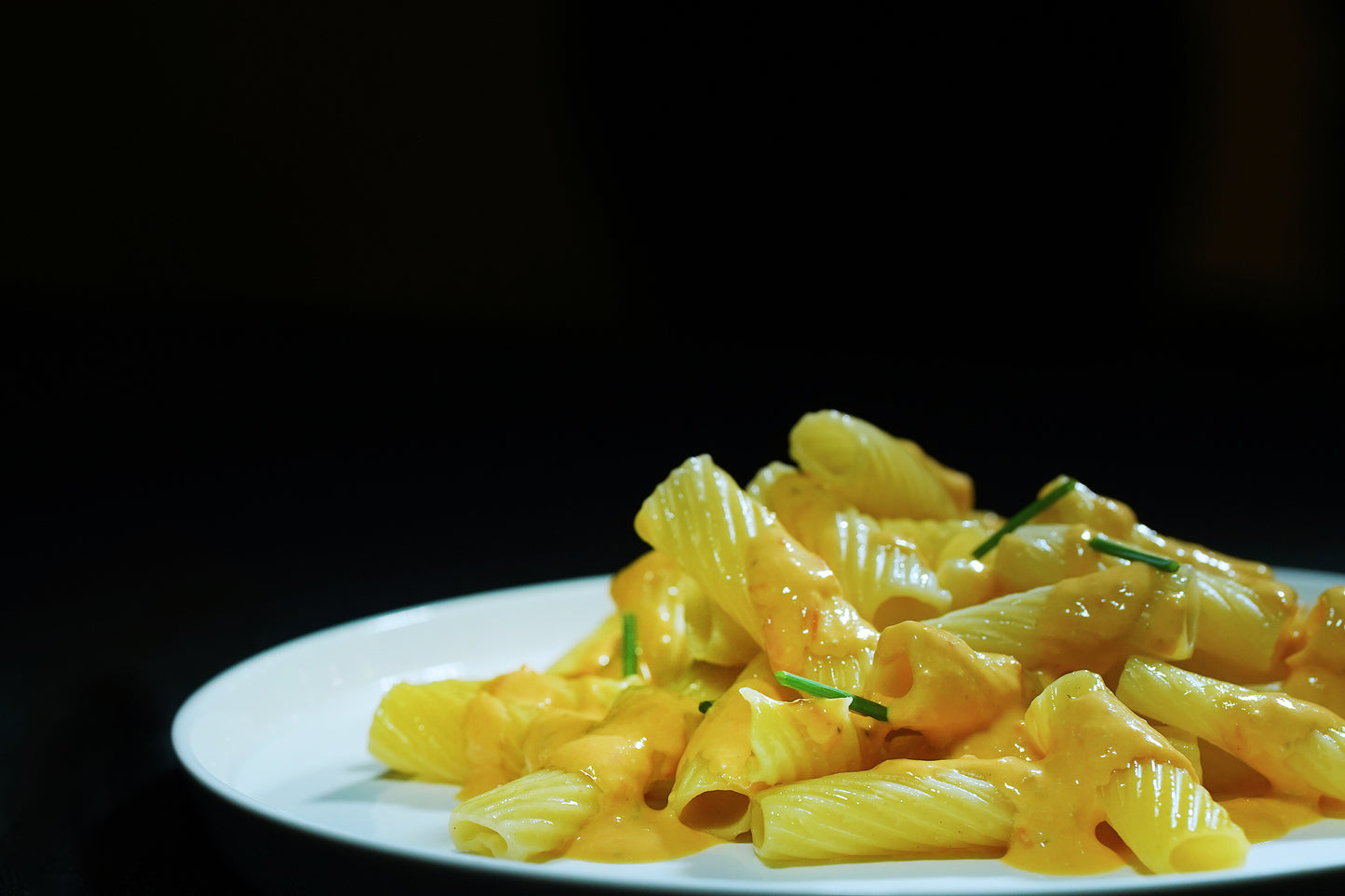 Pasta con salsa cítrica de tomate cherry y queso feta